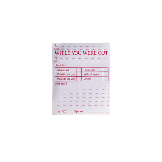 A notepad with the title 'While You Were Out' and sections to fill in missed messages.  