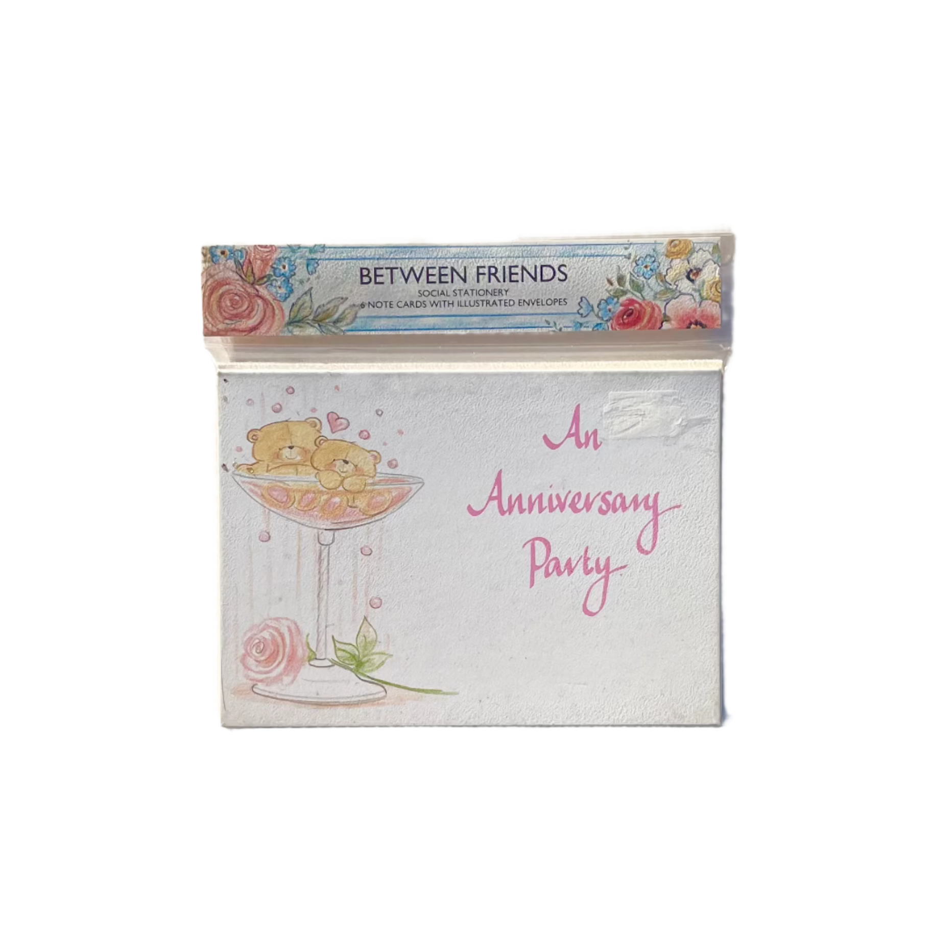 A set of 'Between Friends' anniversary invitation cards with a teddy bear design saying 'An Anniversary Party'.
