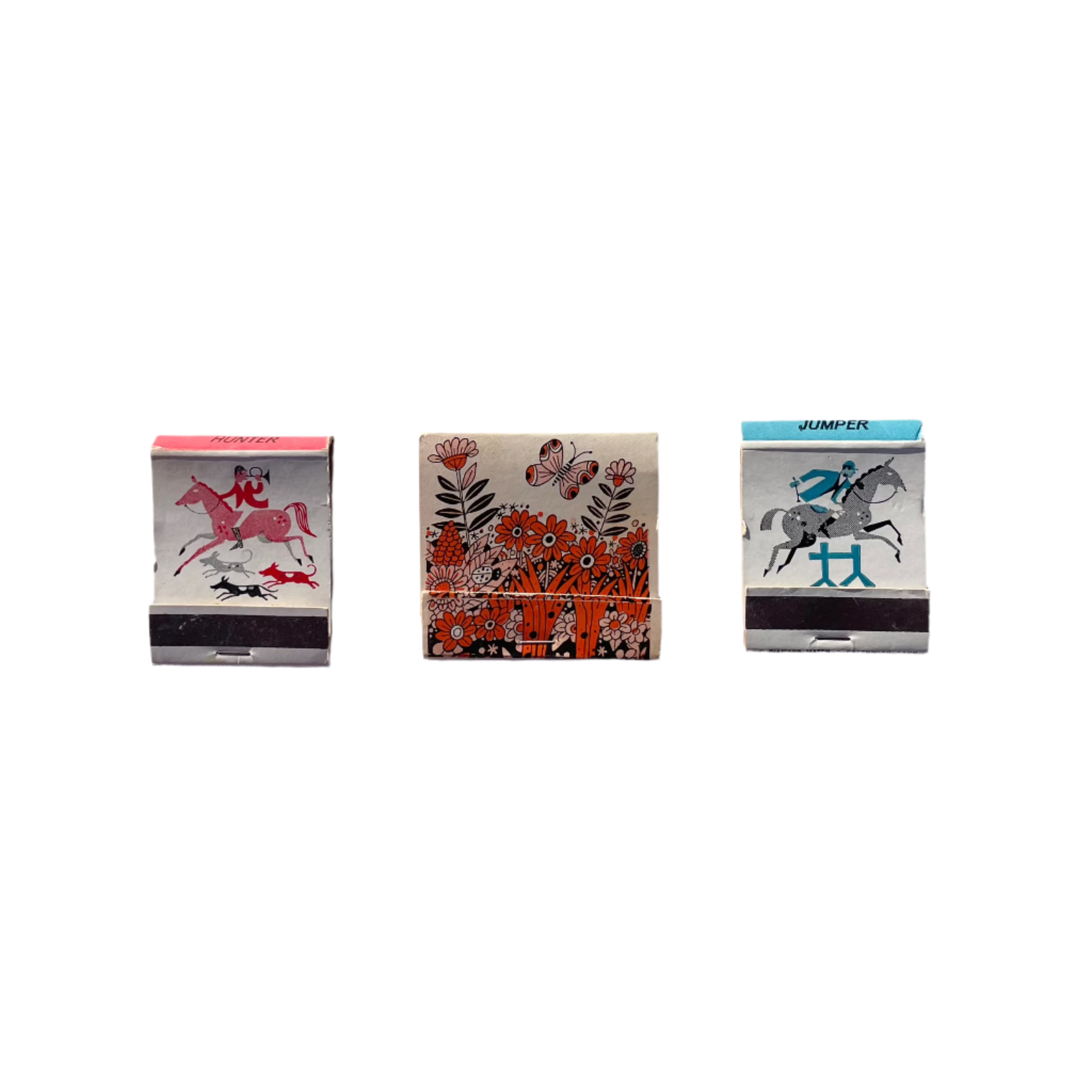 Three vintage matchbooks with visible designs laid out on a surface.