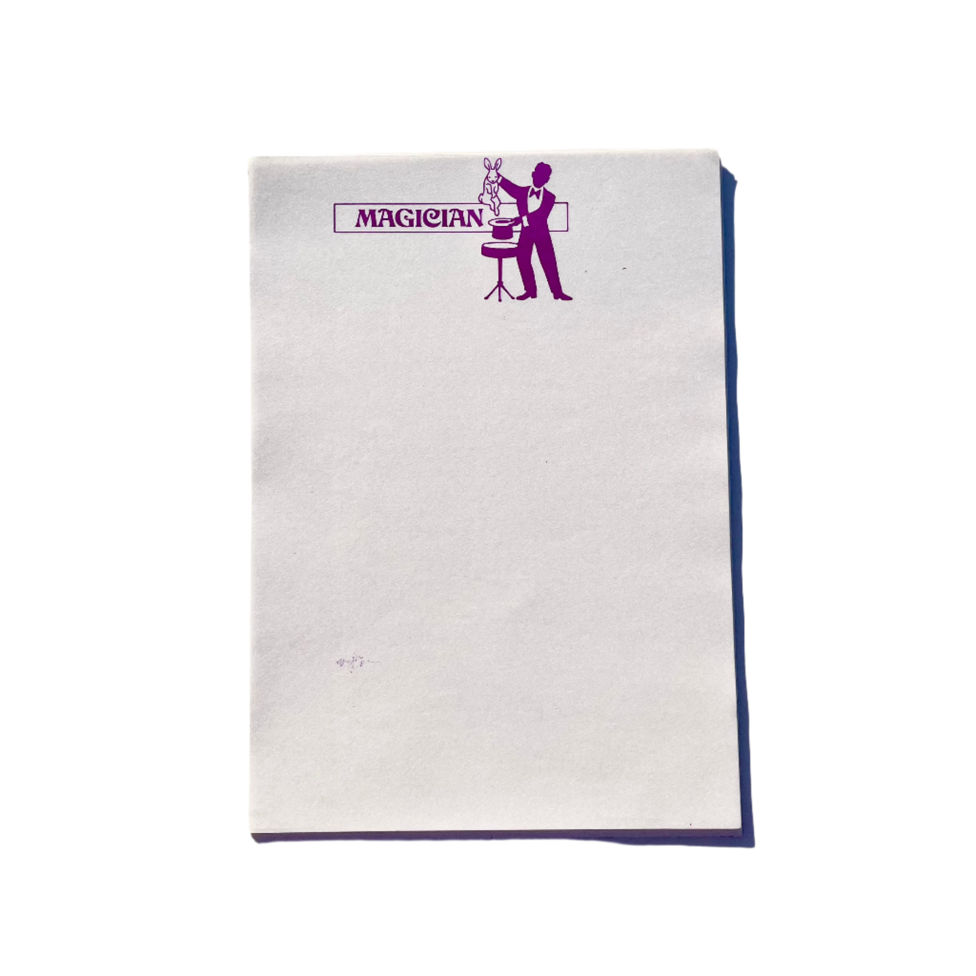 Sheets of white writing paper with a purple print of a magician at the top, titled 'MAGICIAN' beside the illustration.