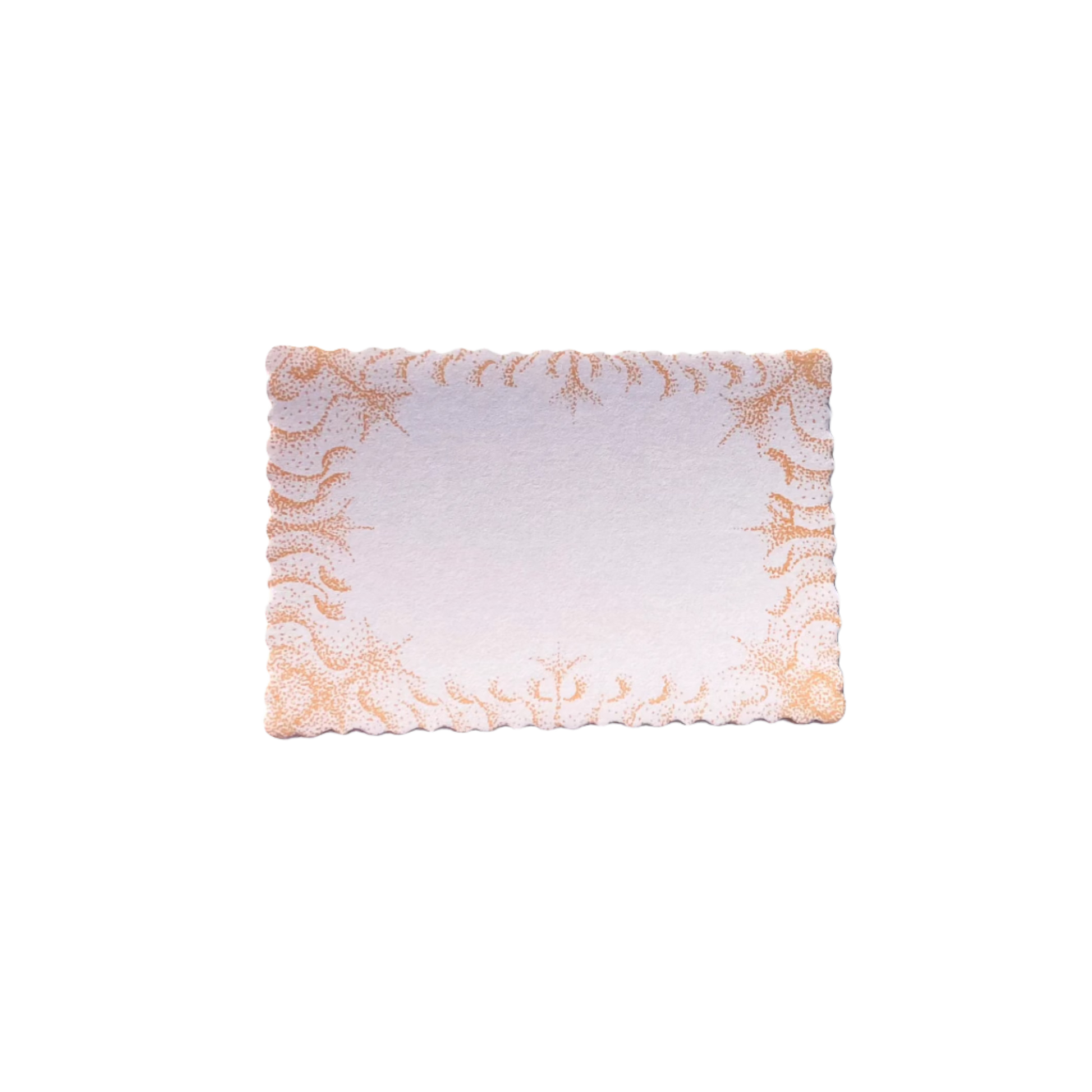 Scalloped edge paper notecards with an orange dot design.