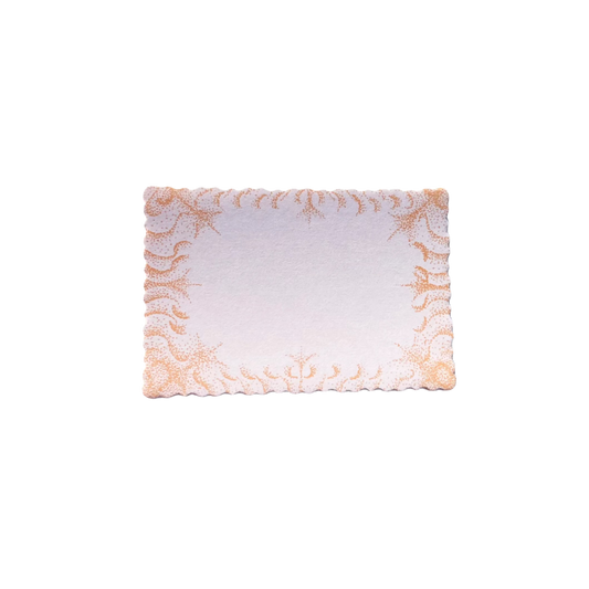 Scalloped edge paper notecards with an orange dot design.