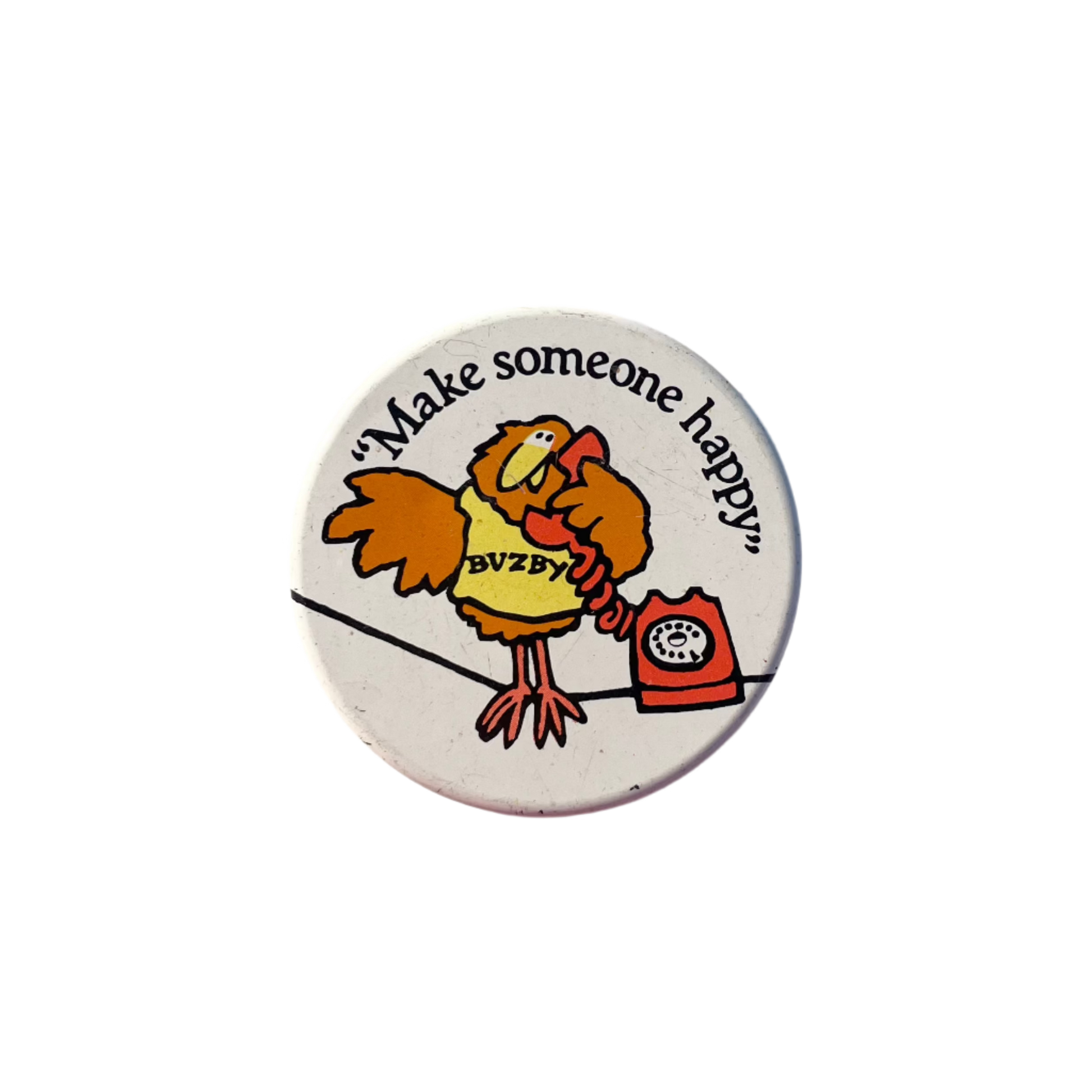 A round badge with an illustration of a cartoon bird 'Buzby' with a telephone, and the text 'Make someone happy'.